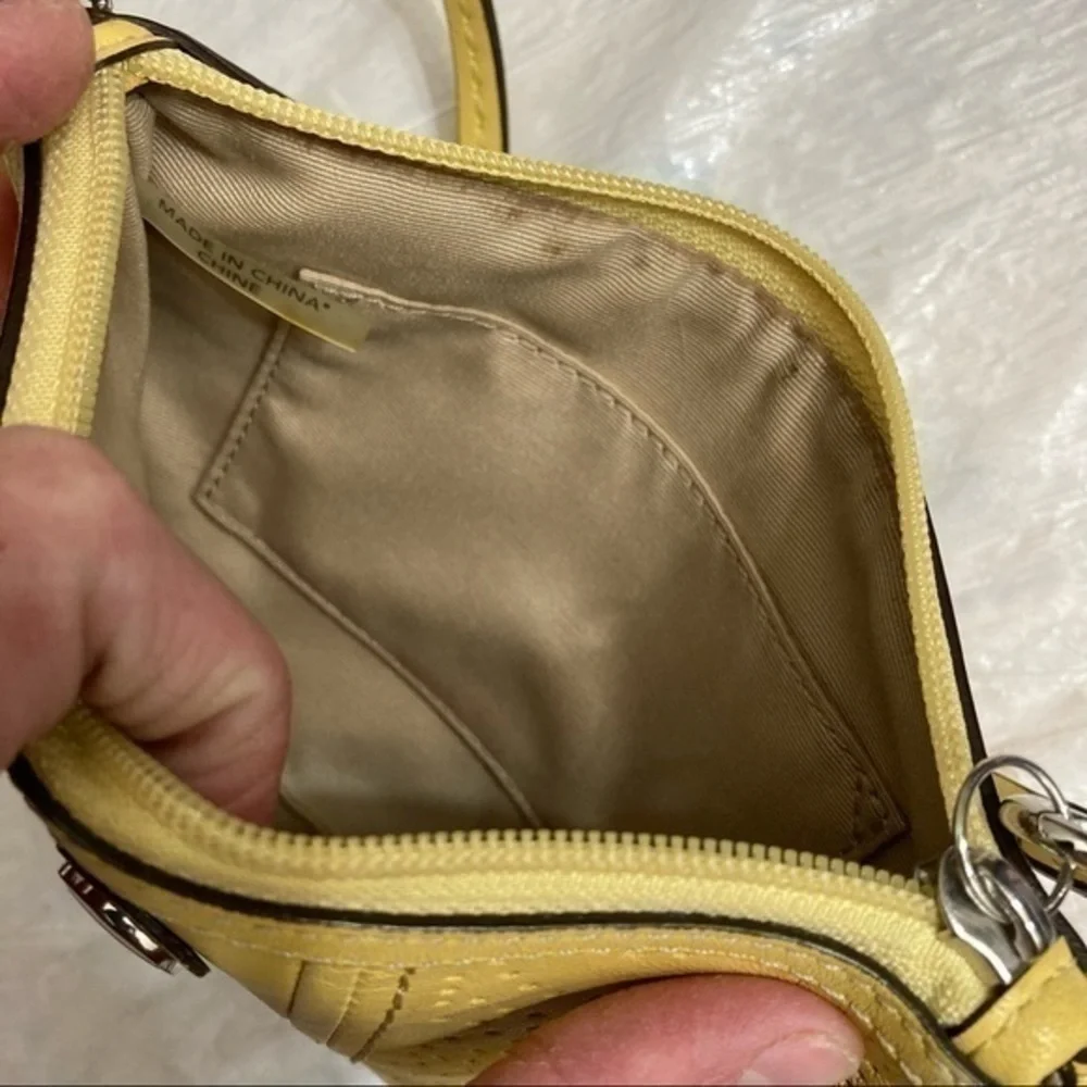 Coach yellow vintage y2k leather perforated signature c wristlet bag
